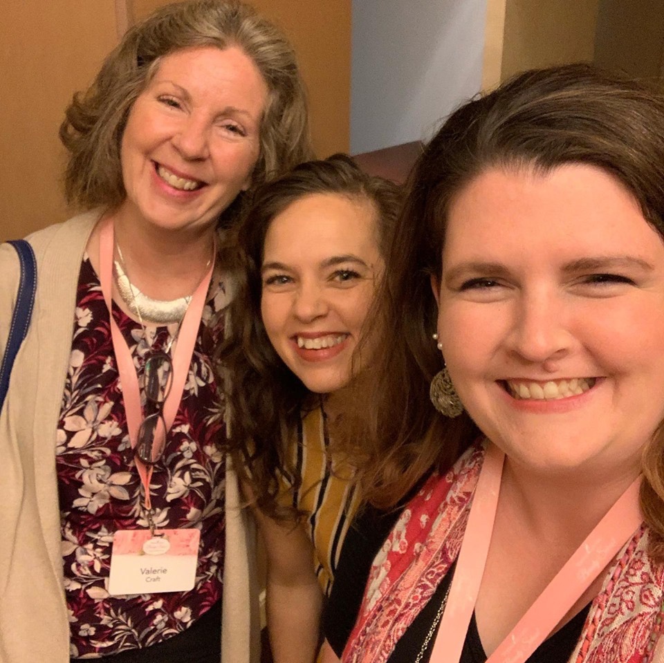 With friends at a conference